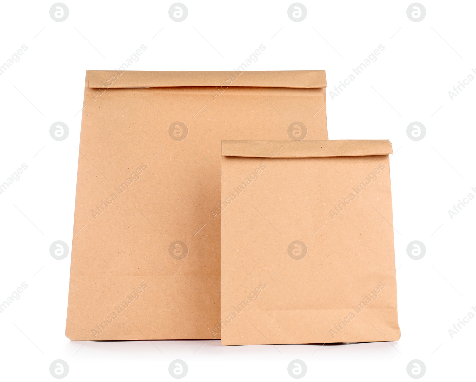 Photo of Paper bags isolated on white. Mockup for design