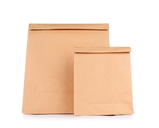 Photo of Paper bags isolated on white. Mockup for design