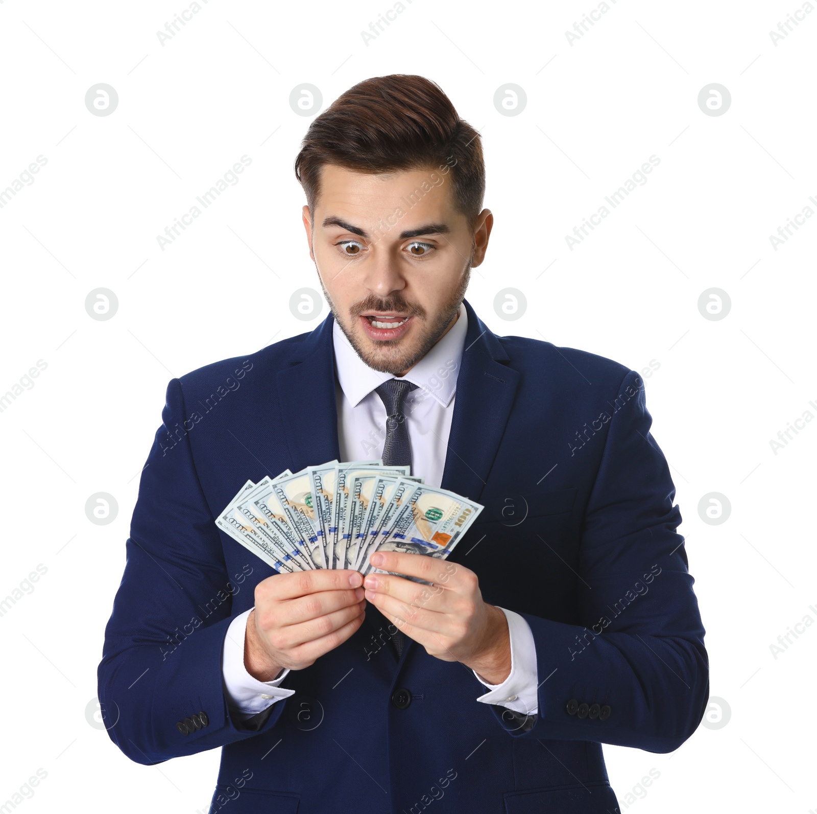 Photo of Excited young businessman with money on white background