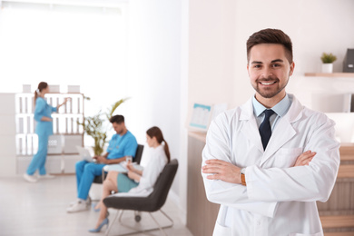Photo of Portrait of male doctor in modern clinic
