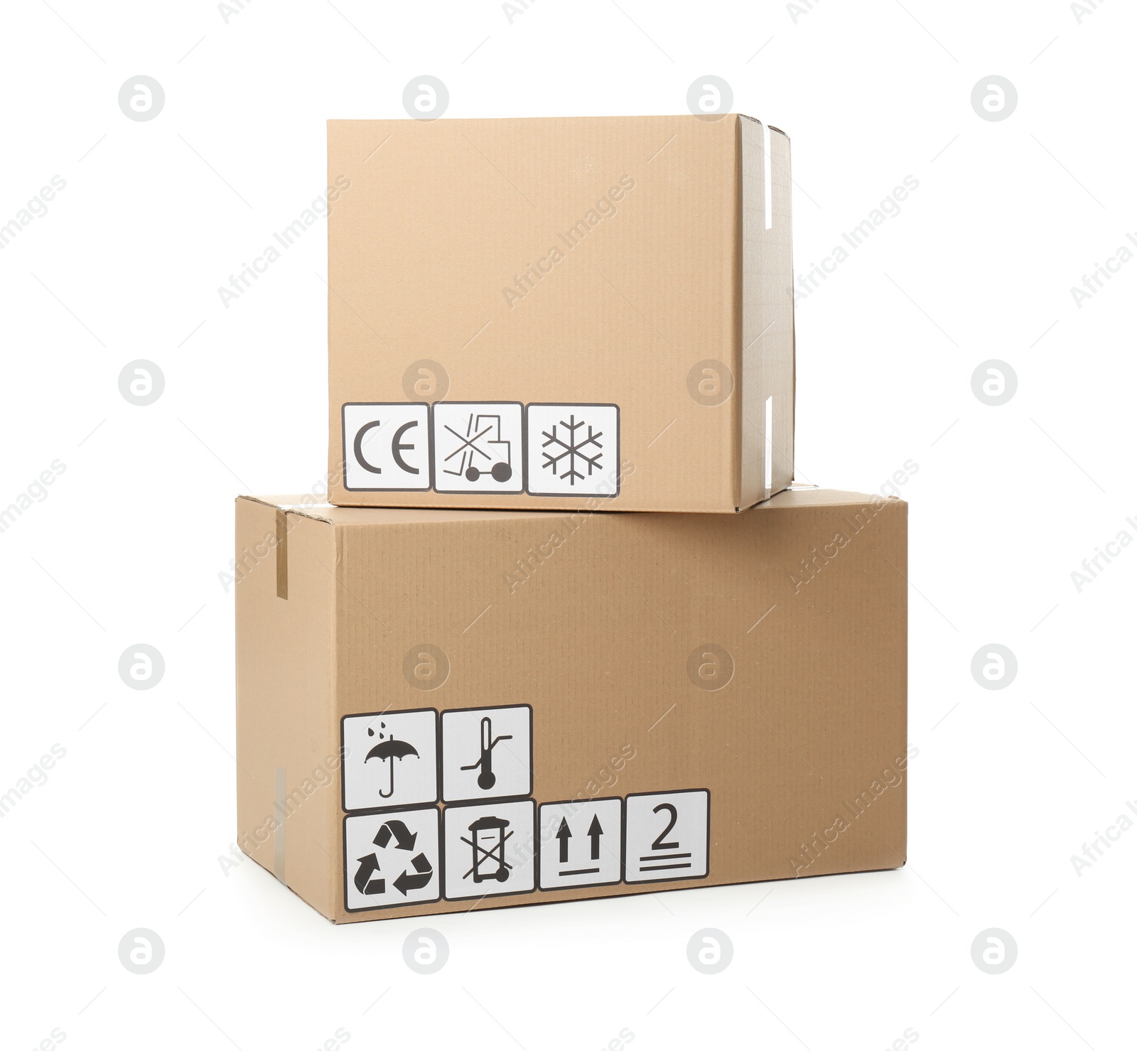 Photo of Cardboard boxes with different packaging symbols on white background. Parcel delivery