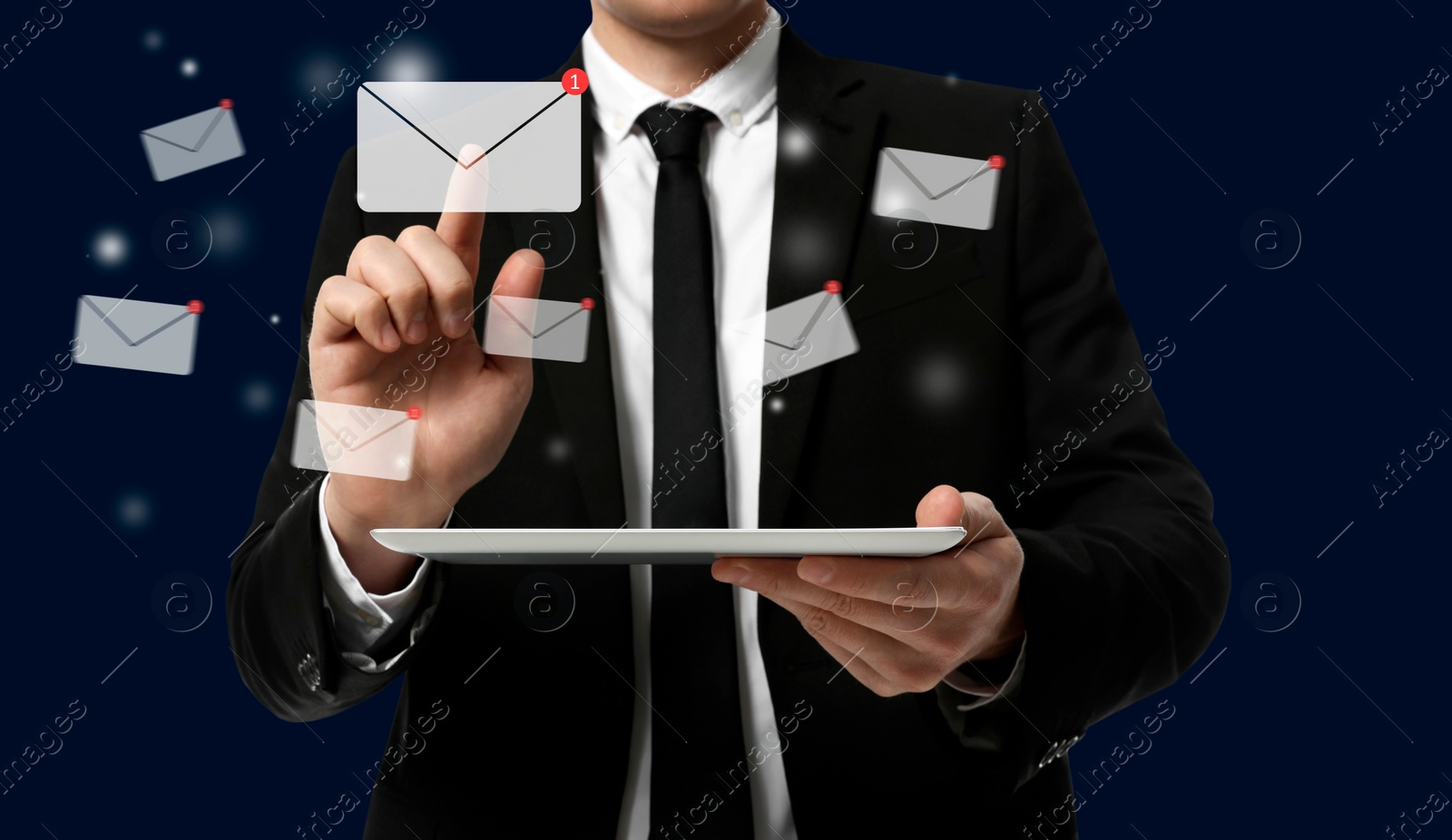 Image of Incoming email. Man touching virtual envelope over tablet against dark blue background, closeup