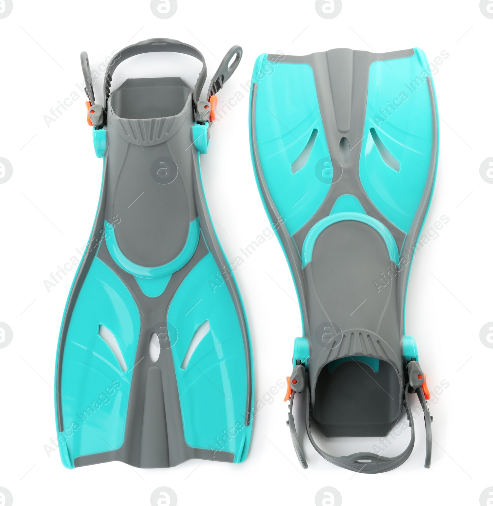 Photo of Pair of turquoise flippers on white background, top view