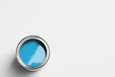 Photo of Paint can on white background, top view. Space for text