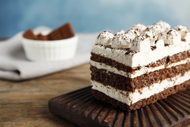 Photo of Tiramisu cake on table, closeup. Space for text