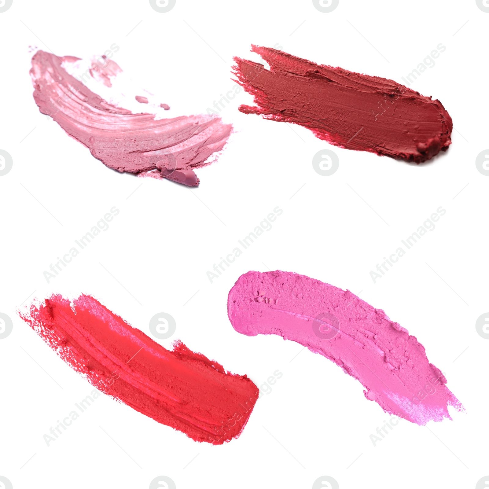 Image of Smears of different beautiful lipsticks on white background, top view