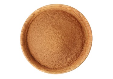 Photo of Dry aromatic cinnamon powder in wooden plate isolated on white, top view