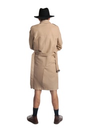 Photo of Exhibitionist in coat and hat isolated on white, back view