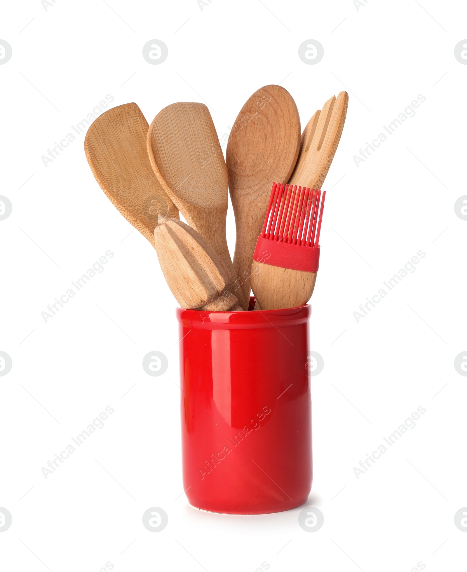 Photo of Kitchen utensils made of bamboo in stand on white background