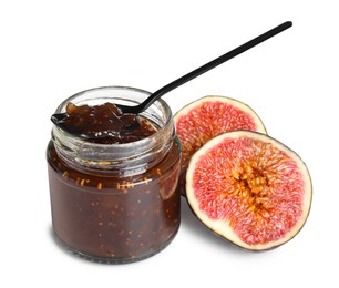 Photo of Glass jar of tasty sweet fig jam and spoon isolated on white