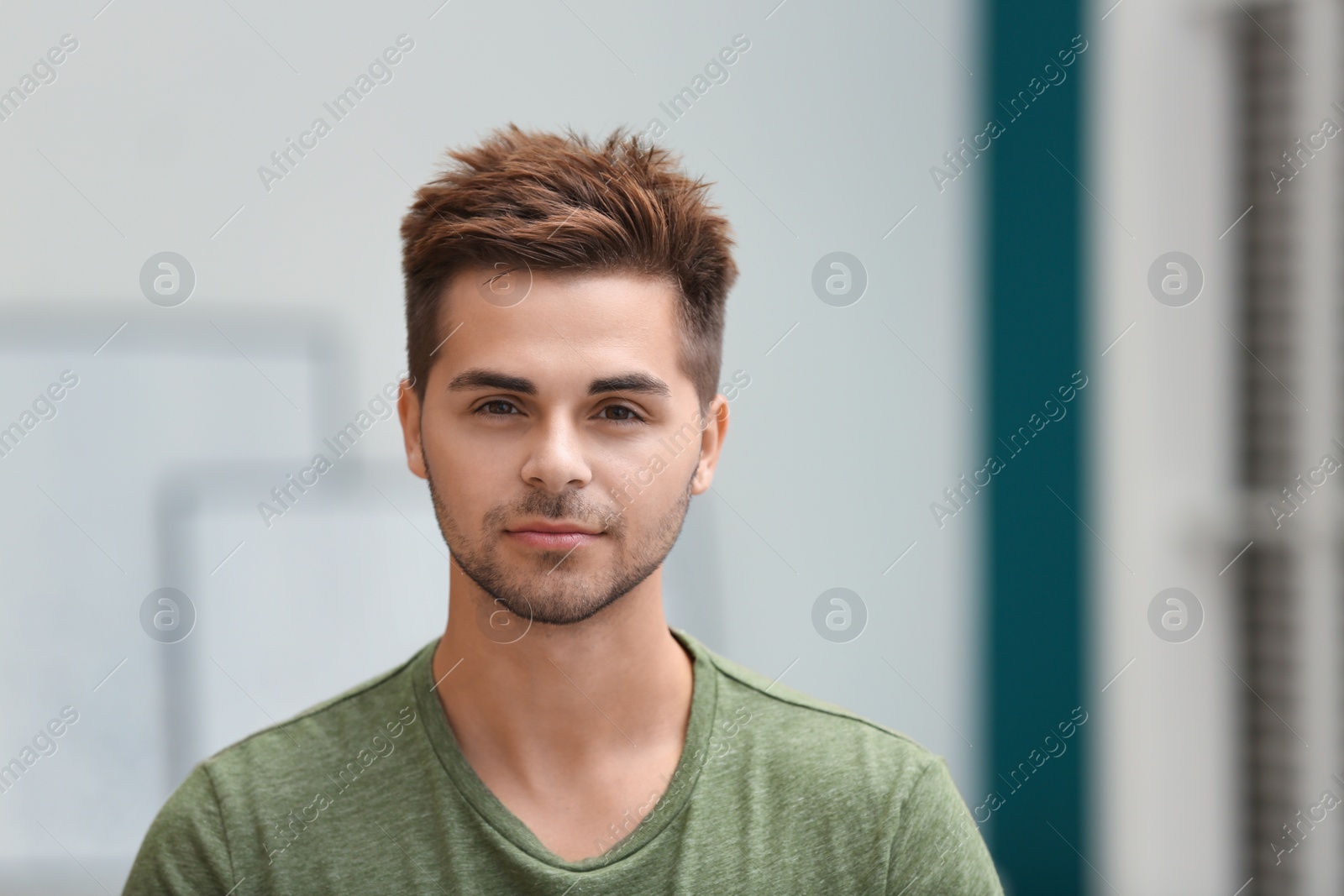 Photo of Portrait of handsome young man in room