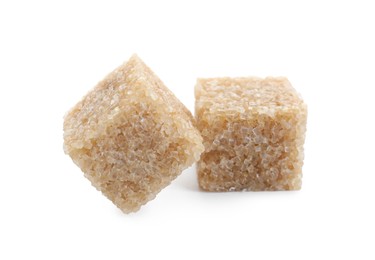 Photo of Two brown sugar cubes isolated on white