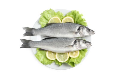 Photo of Plate with fresh sea bass fish, lettuce and lemon on white background, top view