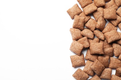 Photo of Delicious chocolate corn pads on white background, top view