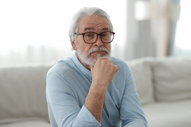 Photo of Portrait of grandpa with stylish glasses indoors