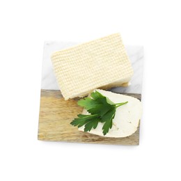 Photo of Tasty tofu cheese isolated on white, top view