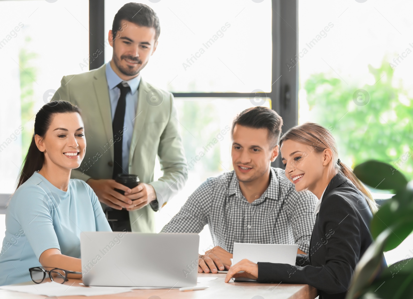 Photo of Office employees having business training at workplace