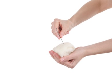 Photo of Woman needle felting from wool on white background, closeup