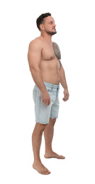 Photo of Full length portrait of shirtless man on white background