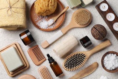 Photo of Flat lay composition with different spa products on light grey textured table