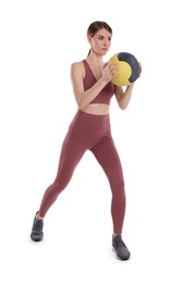 Photo of Athletic woman doing exercise with medicine ball isolated on white