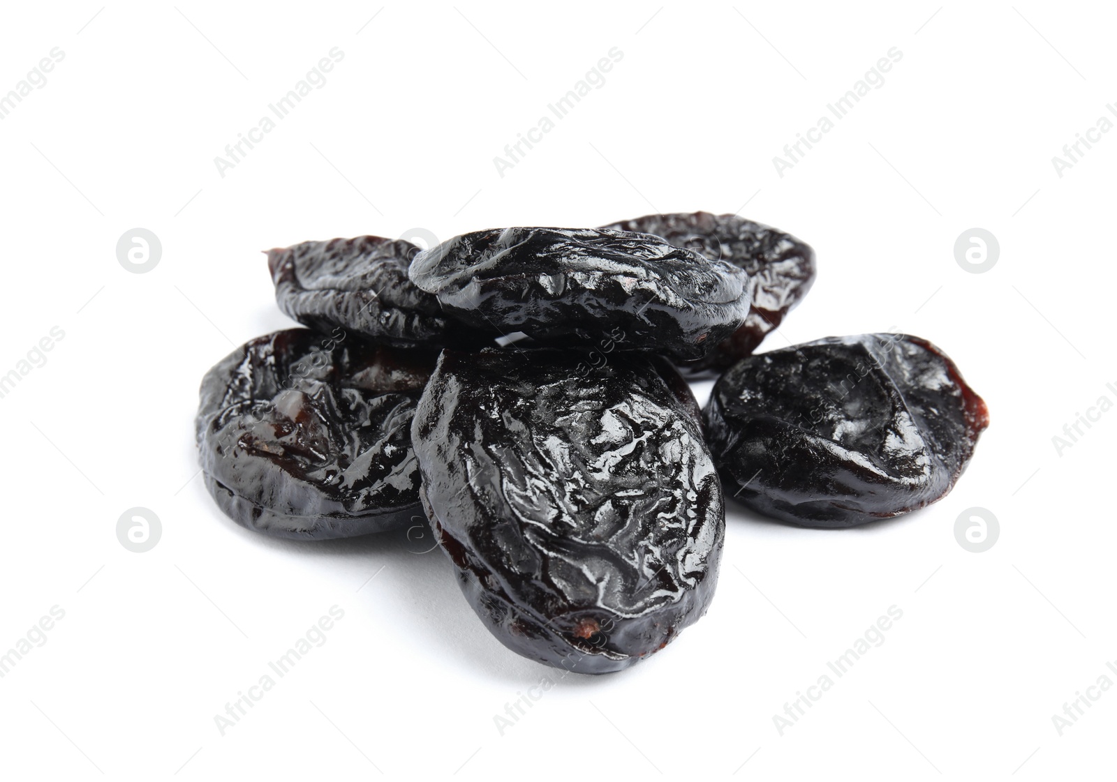 Photo of Heap of tasty prunes on white background. Dried fruit as healthy snack