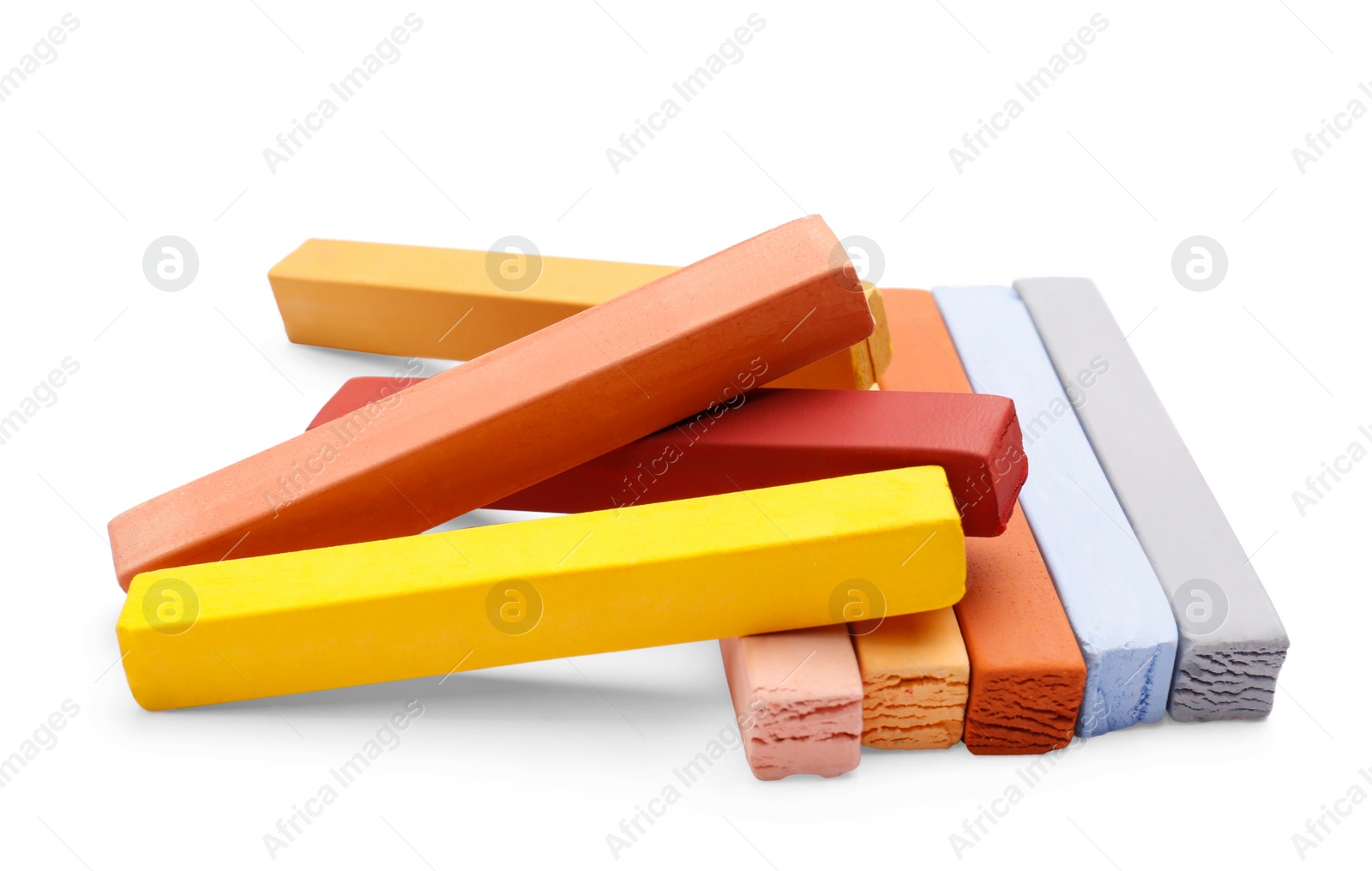 Photo of Colorful pastels on white background. Drawing materials