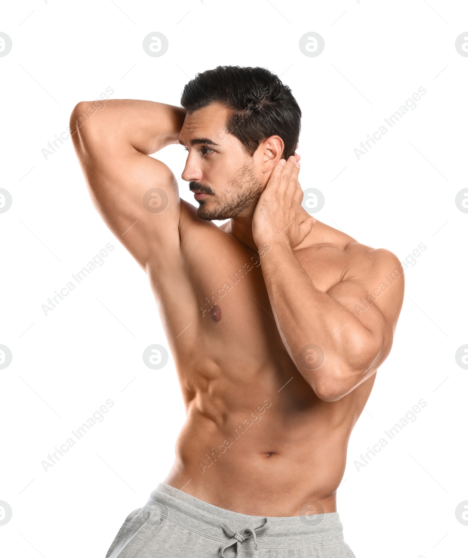 Photo of Young man with slim body on white background