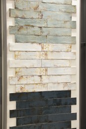 Samples of tile colors display in store