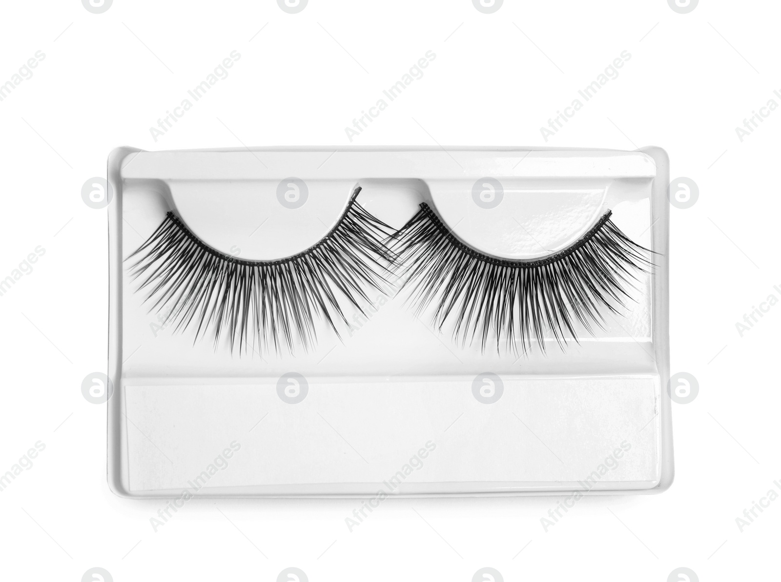 Photo of False eyelashes on white background