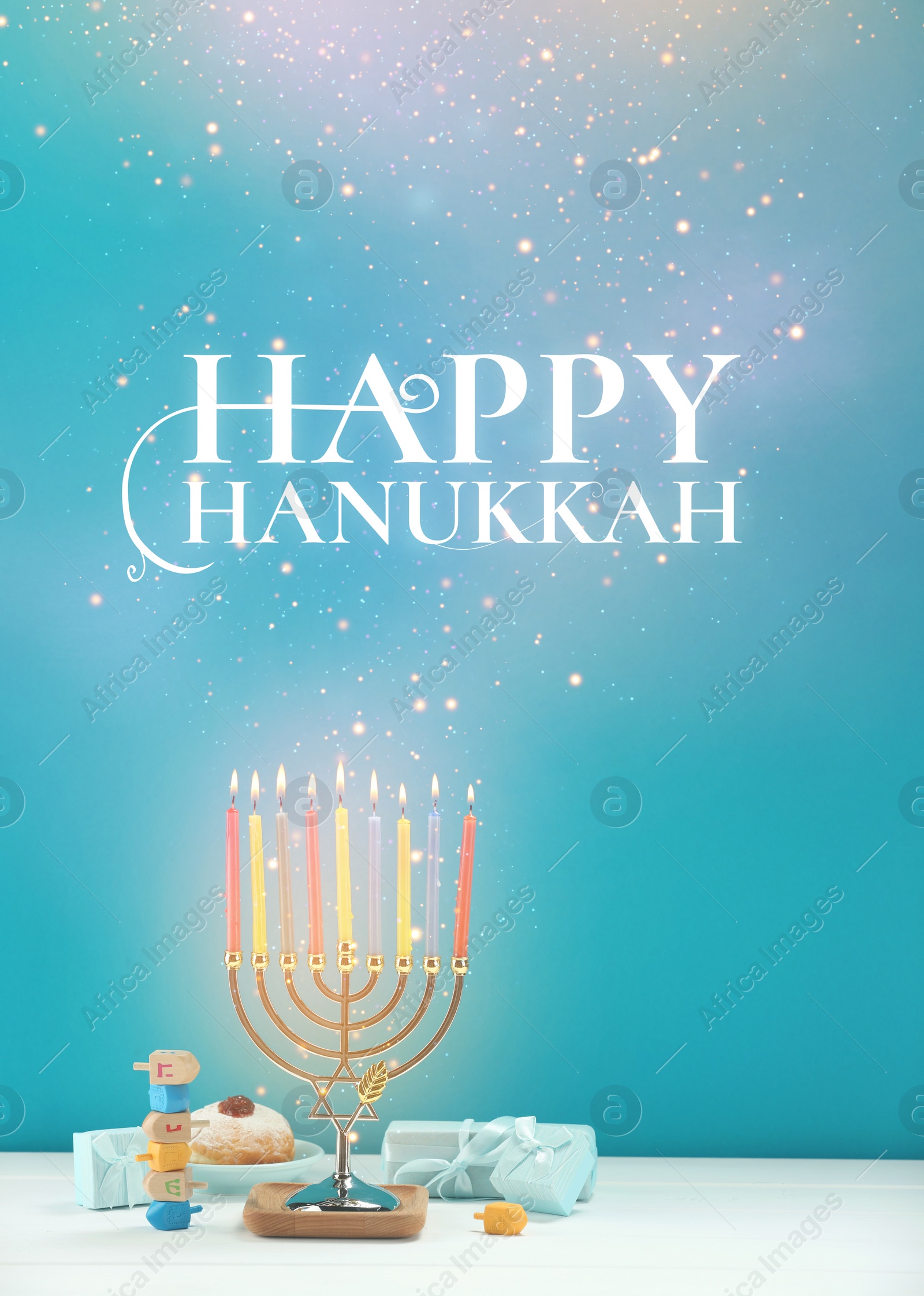 Image of Happy Hanukkah. Menorah, donut, dreidels and gifts on white table against turquoise background