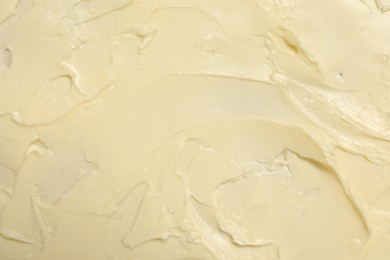 Photo of Texture of fresh natural butter as background, top view