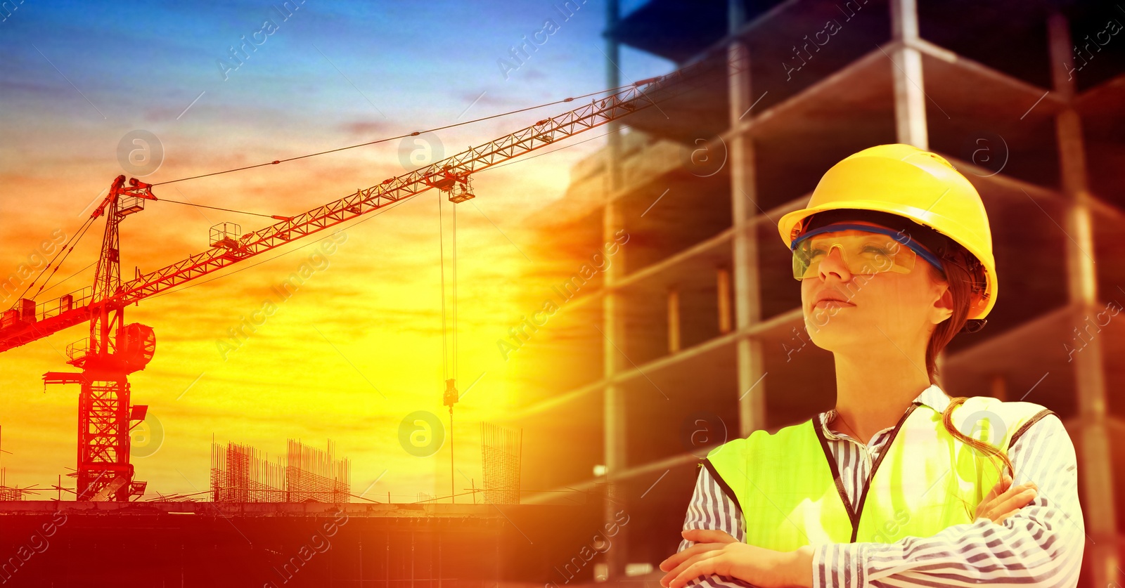 Image of Professional engineer in safety equipment at construction site