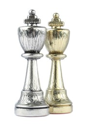 Photo of Silver and golden kings on white background. Chess pieces