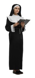 Photo of Young nun with Bible on white background