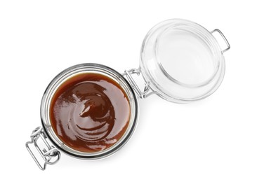 Photo of Tasty barbecue sauce in glass jar isolated on white, top view