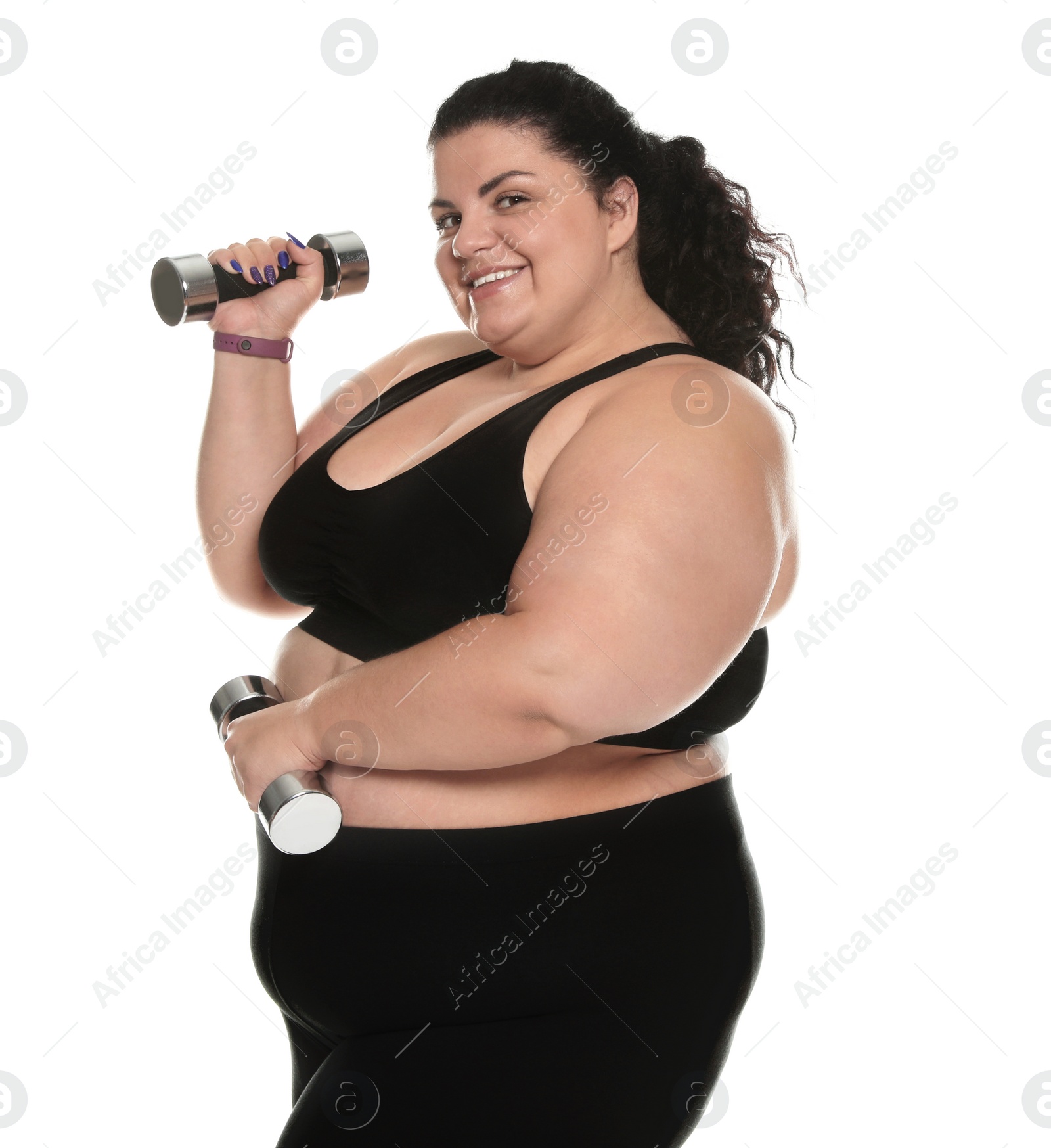 Photo of Overweight woman with dumbbells on white background