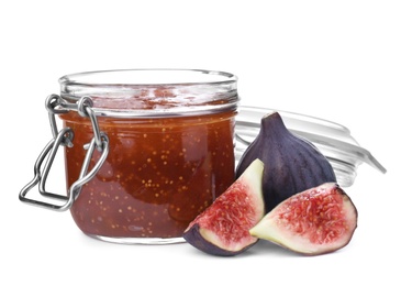 Homemade delicious fig jam and fresh fruits on white background