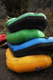 Photo of Many different inflatable rubber fishing boats outdoors