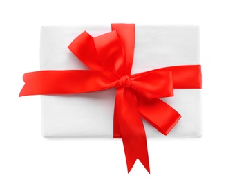 Gift box with red ribbon on white background, top view