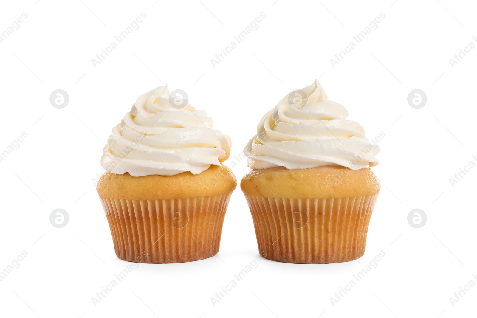 Photo of Delicious cupcakes decorated with cream on white background