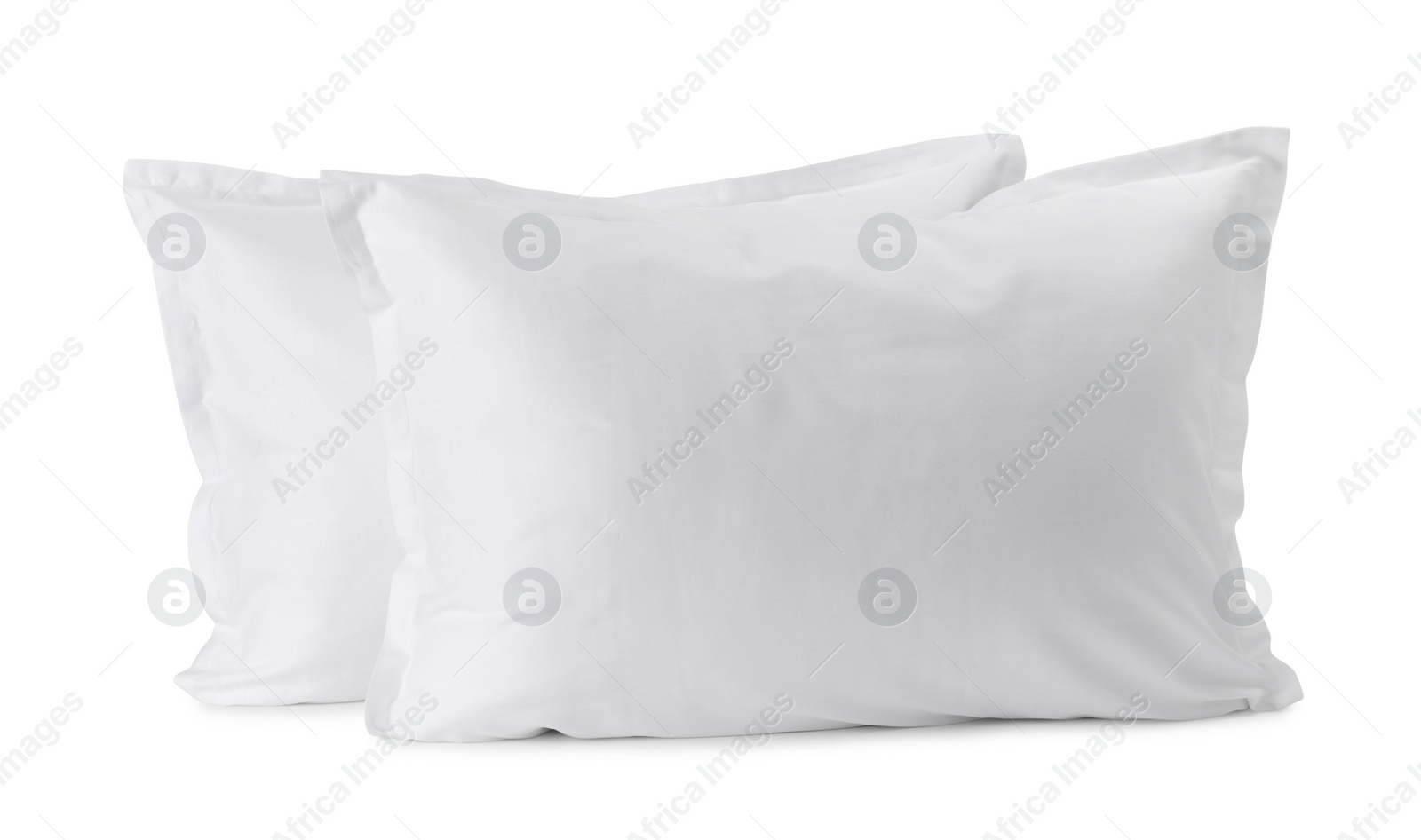 Photo of Two new soft pillows isolated on white