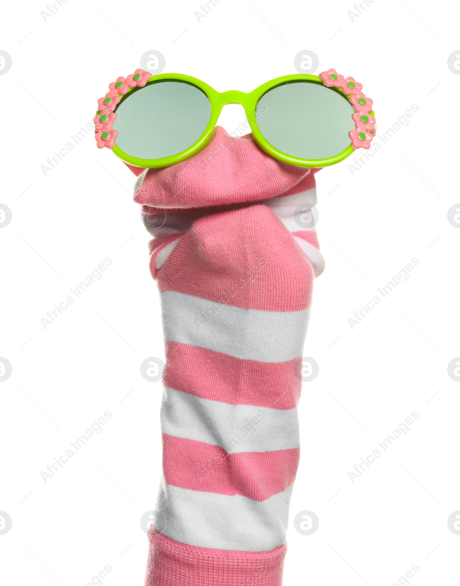 Photo of Funny sock puppet with sunglasses isolated on white