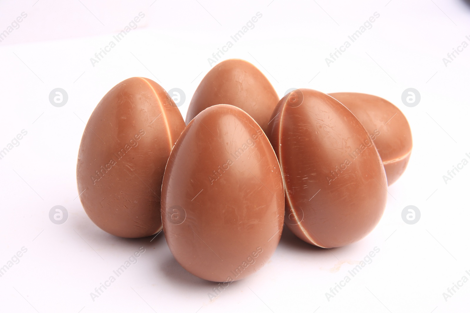 Photo of Sveti Vlas, Bulgaria - June 27, 2023: Unwrapped Kinder Surprise Eggs isolated on white