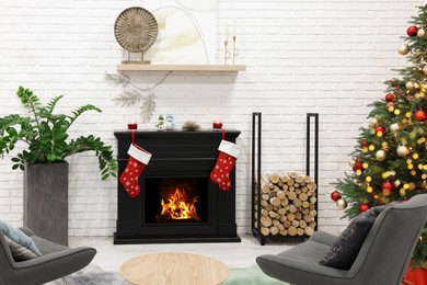 Photo of Beautiful Christmas tree near fireplace and cosy armchairs in room. Interior design