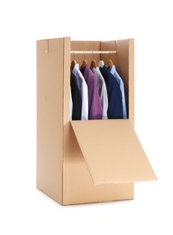 Photo of Wardrobe box with clothes on white background