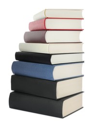 Many different books stacked on white background