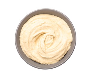Photo of Tasty hummus in bowl isolated on white, top view