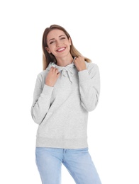 Portrait of woman in hoodie sweater on white background. Space for design