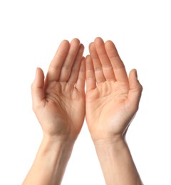 Photo of Religion. Woman with open palms praying on white background, closeup